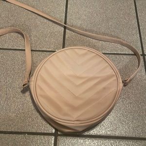 Women’s round shaped pink purse bag
